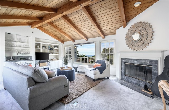 Upstairs family room with balcony and ocean views