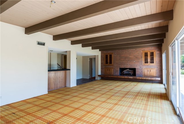 Another view of recreation room with wet bar.