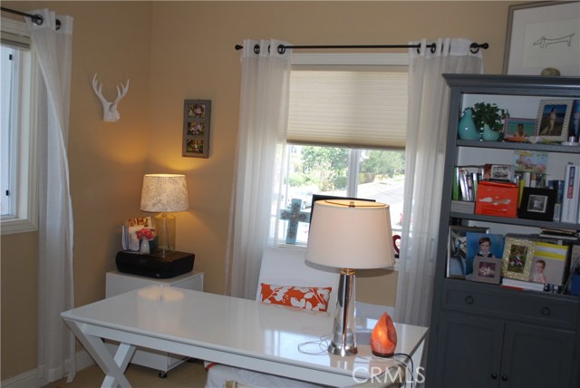 Bedroom #4 with mirrored closet doors...currently being used as a home office.