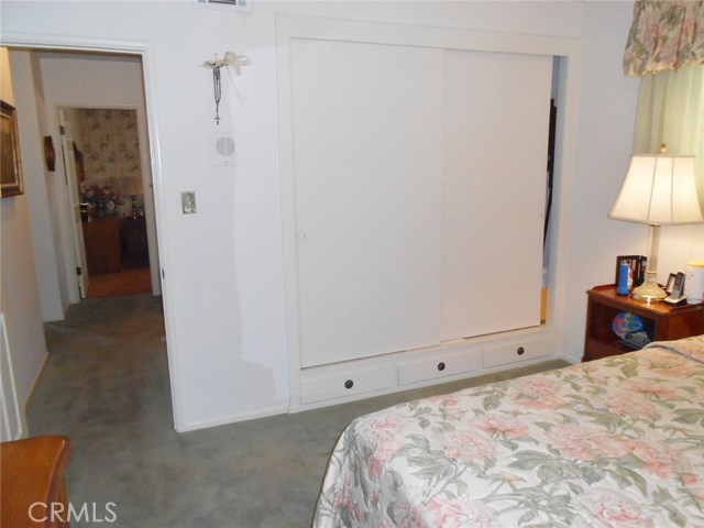 Large Closet with Custom Lower Drawers.