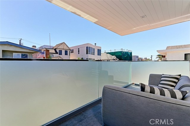 Deck off master bedroom with T&G ceiling, privacy glass