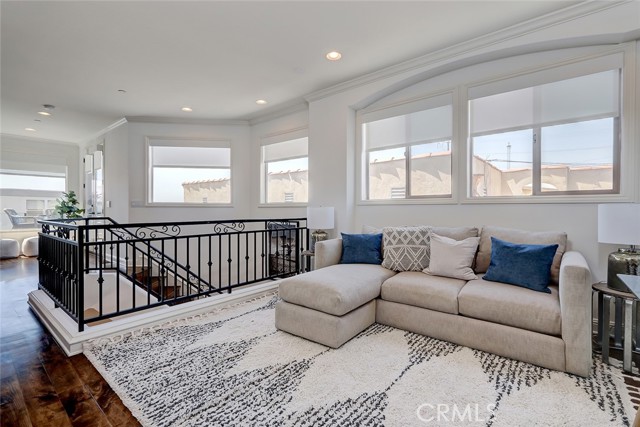 Top level is open and beautiful and the adaptable family room area can be anything from a formal dining, to an office, to den or playroom