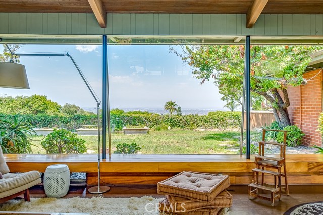 View from entry and living room across the lawn to unobstructed view