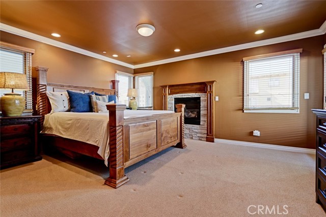 Oversized master suite is sure to impress with it's own fireplace, deck and walk-in closet.