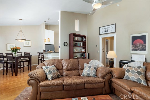 Living room facing kitchen and dining area.