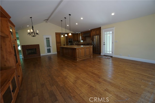 One Great room. Kitchen, dining and family room,. There's also a private formal living room.