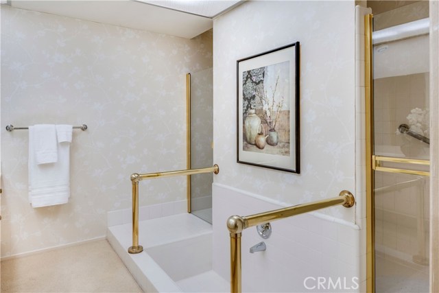 Private water closet, shower and sunken bath