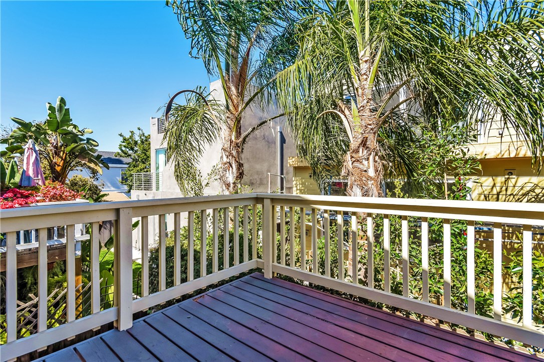 The large private master bedroom deck is surrounded by lush landscaping creating a relaxing and tranquil enviornment.