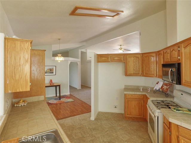 The design of this spacious kitchen allows the chef of the family to be  in on the action