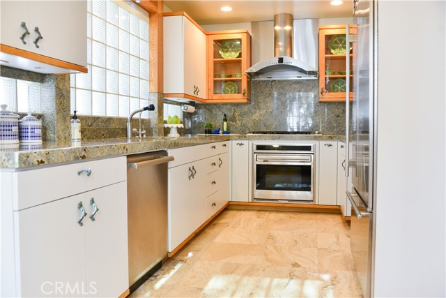 Many Thanksgiving, and Christmas dinners were cooked in this wonderfully efficient remodeled kitchen. Note the glass bricks over the sink that were installed  when this landmark cottage was constructed .