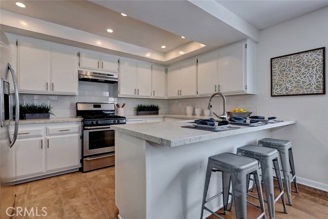 Pull up to the breakfast bar for a quick meal, a snack, or have a cocktail while the cook's in the kitchen!