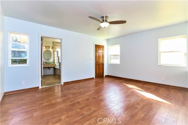 The Master Bedroom has an adjoining remodeled bath.