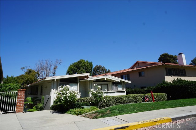 Entire frontage, facing Via Campesina is #A.  Private lighted walkway on east side to front door. Groceries can be unloaded from front at street yellow curb loading zone, if more convenient.  Looks and feels like a home.