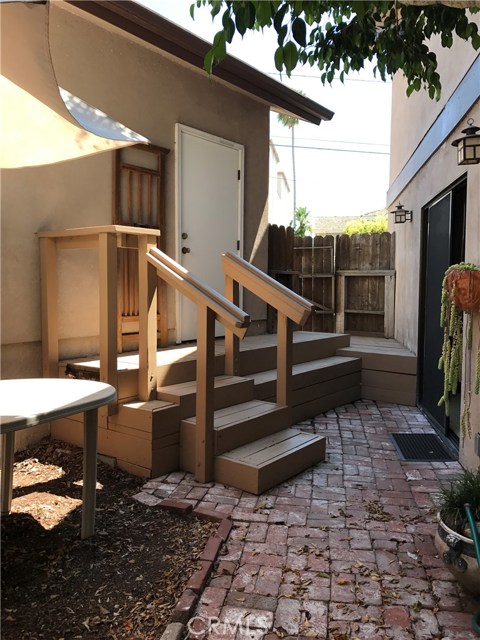 Yard space between house and garage