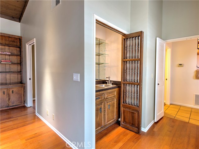 Family room includes a wet bar