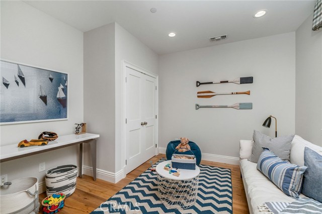 Stash the kids stuff in here or your hobbies! Main level fifth bedroom accessed by barn door enclosure can be used as a true bedroom, playroom, gym, office.. anything your heart desires.