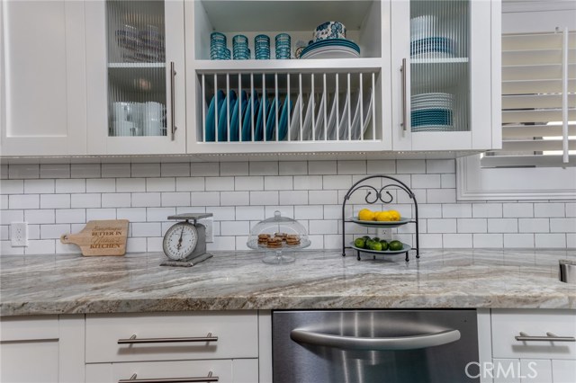 Custom cabinets and plate racks for accessibility.