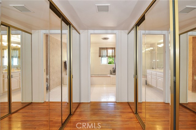 His and her closets in master bedroom which leads to master bath