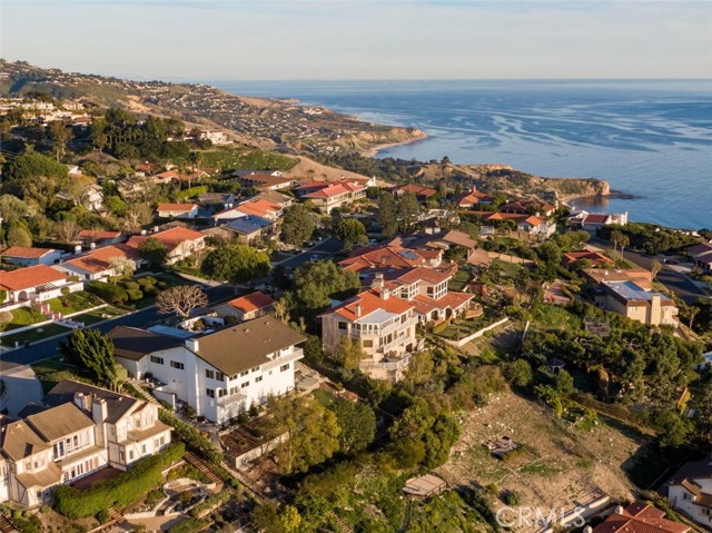 Aerial Viewing Southwest Back of House / Coastline