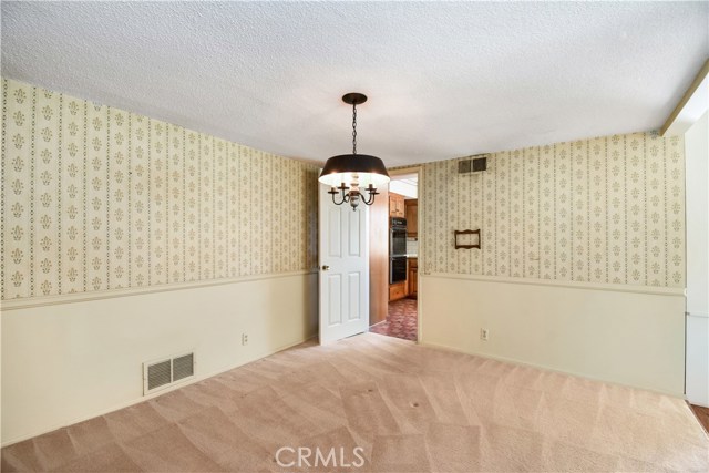 Formal dining room to kitchen view