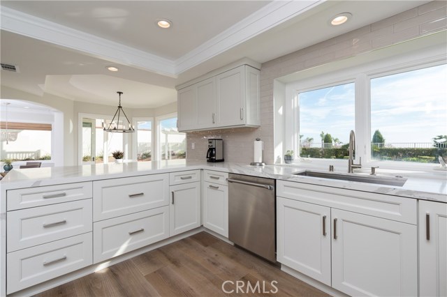 Wide peninsula counter opens onto the perfect casual eating area and adjacent family room!