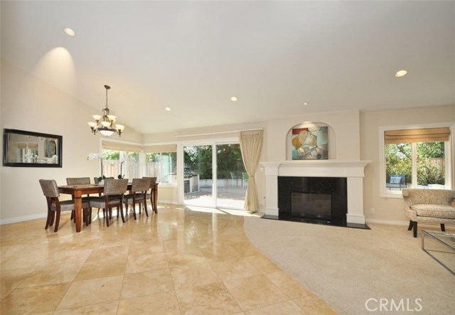 Dining Area & Living Room with High Ceiling