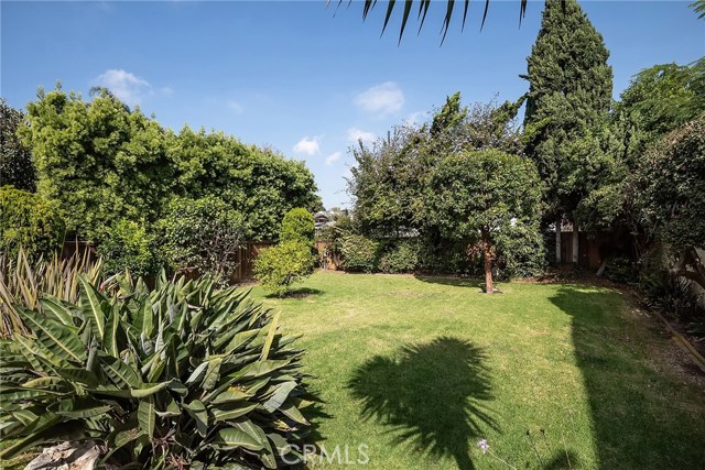 manicured lawn and mature foliage...