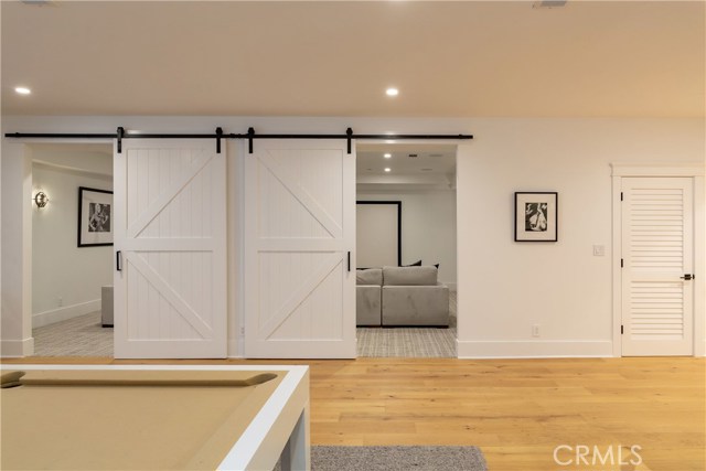 Gorgeous Barn doors leading to Theatre room