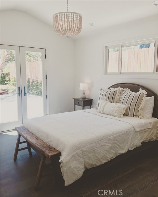 Master bed room, vaulted ceiling, French doors to backyard