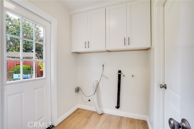 Laundry room right off the kitchen.