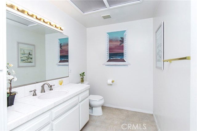 Guest bathroom by the living room and kitchen