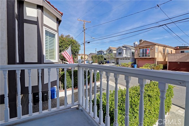 Balcony off the living room that over looks the neighborhood.