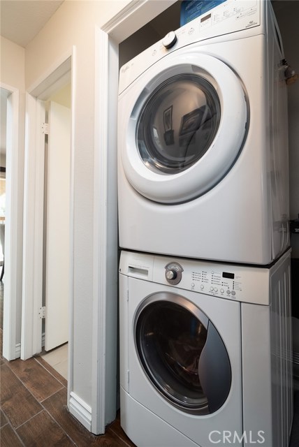 Inside Laundry Area with Stackable Washer and Dryer Included Inside Laundry Area with Stackable Washer and Dryer Included