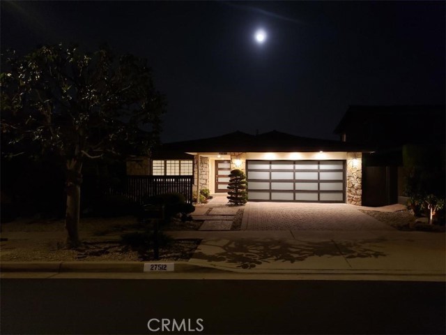 Custom lighting front of house.