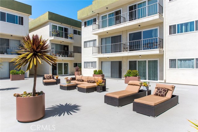 Large courtyard has nice landscaping and comfortable outdoor seating