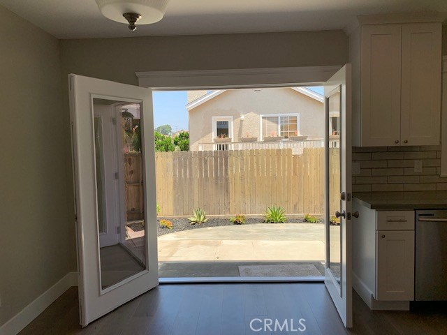 French doors leading to backyard, from kitchen area.
