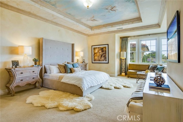 Beautiful large Master Bedroom with a sitting area and an ocean view.