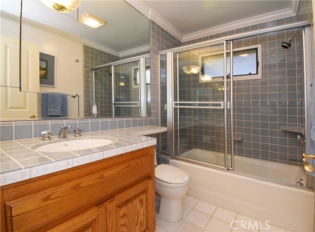 Full bath located in the 2nd master on 1st floor.