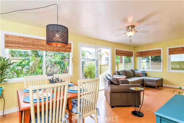 The family room has a dining area overlooking the rear yard.