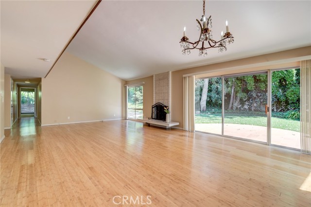 Spacious Living room and Dining room with vaulted ceiling