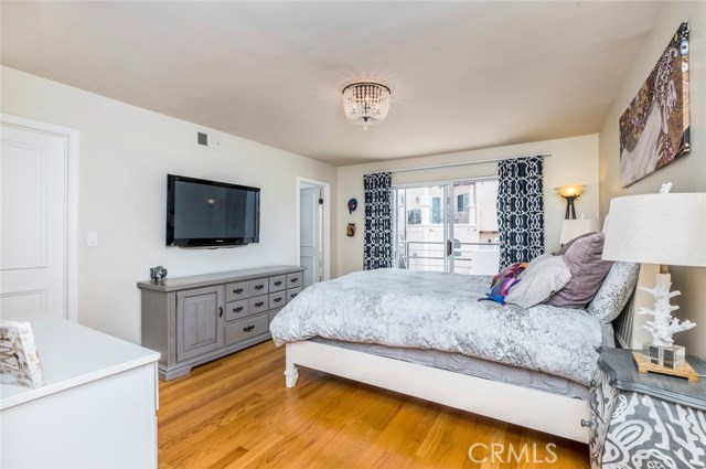 Master bedroom with walk in closet, private balcony and spa-like master bathroom.