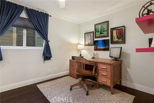 Bedroom #3 is a versatile room with beautiful hardwood floors, newer windows, and a good sized closet.