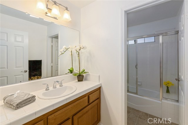Downstairs full bath room for the Two downstairs bedrooms. separate Shower area.