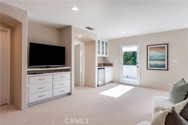 Built ins at Master Bedroom  Small wet bar with refrigerator