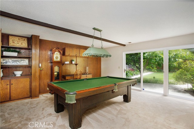 Family room on lower lever opens to lush backyard