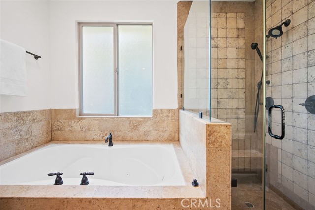 En-suite Soaking tub and shower.