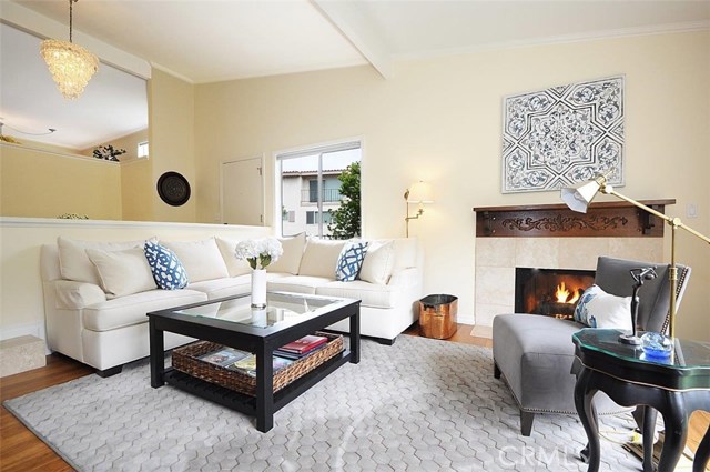 Formal Living Room with Fireplace and lovely Wood Mantle