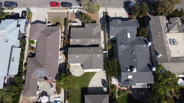Covered patio and nice yard. Large concrete driveway is ideal for RV, boat or ?? parking behind gate. Well kept homes in neighborhood. New homes selling for $3,800,000+ in this neighborhood.
