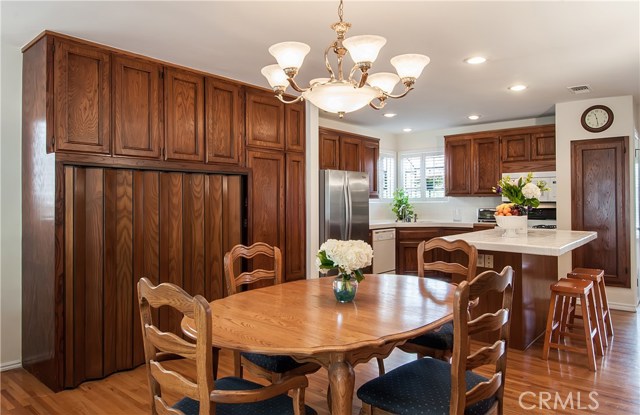 Dining area can accommodate an even large table.  Pantry and laundry area behind bi-folding doors.