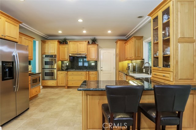 Gourmet kitchen with breakfast bar